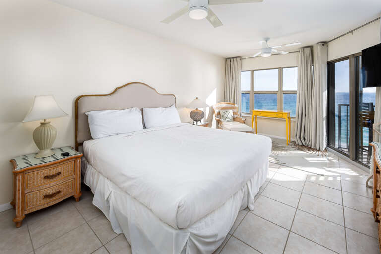 Get a blissful night’s sleep seaside from this cozy master suite. Contemporary furnishings, beige seating and a gorgeous area rug truly complete this beautiful space. Get a blissful night’s sleep seaside from this cozy master suite. Contemporary furnishings, beige seating and a gorgeous area rug truly complete this beautiful space.