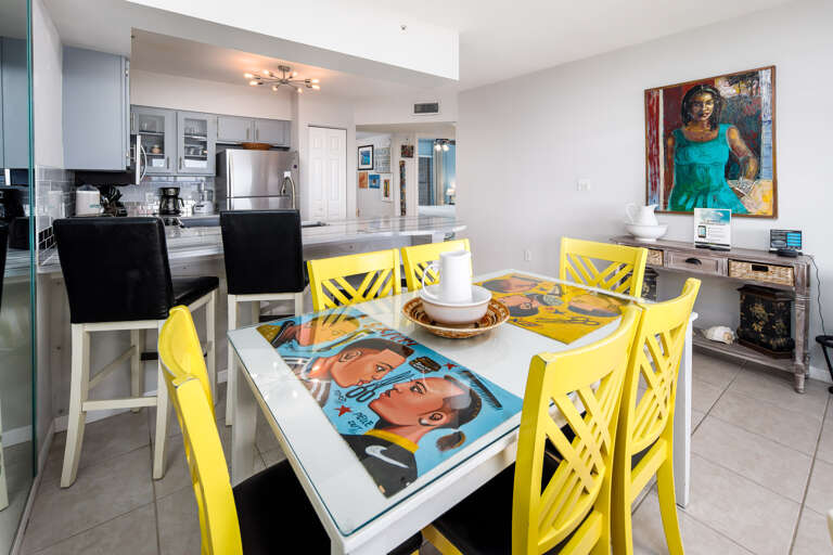 Open floor plan accessorized by gorgeous wall art and flattering color schemes. Open floor plan accessorized by gorgeous wall art and flattering color schemes.