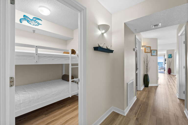 A bunkroom with two additional sleeping spaces allows this two bedroom two bathroom to sleep up to eight guests