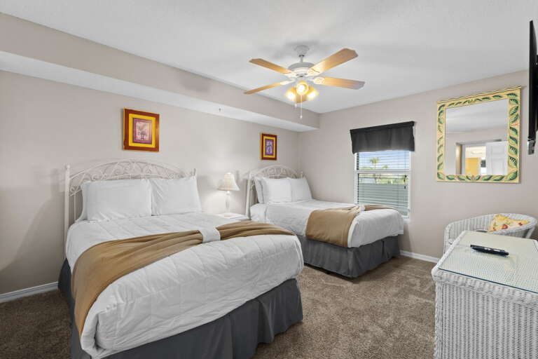 This guest bedroom has 2 full sized beds 