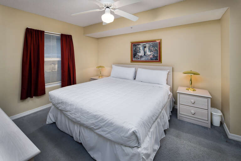 Features a king size bed and access to the bathroom from both the bedroom and the hallway