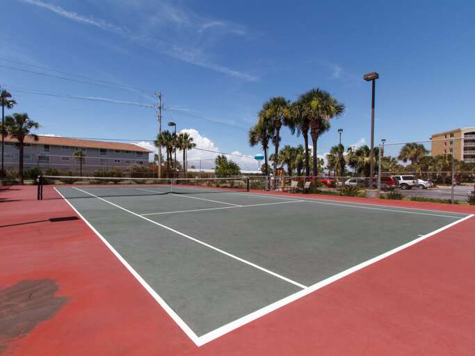Features a tennis court.