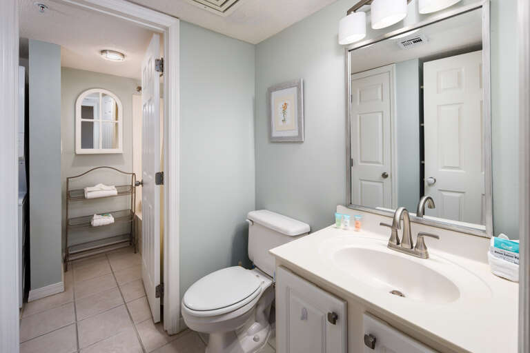 Bathroom entry from the bedroom and hallway