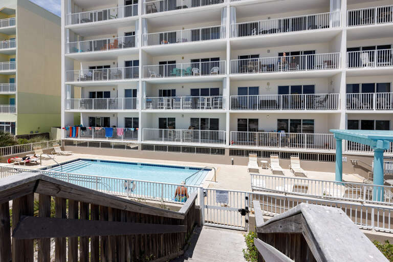 The private beach access is next to the pool!