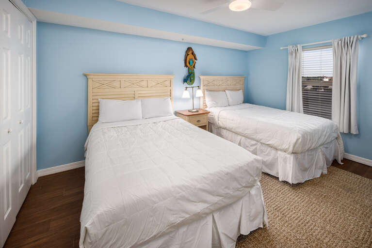 Guest bedroom with 2 full beds Guest bedroom with 2 full beds