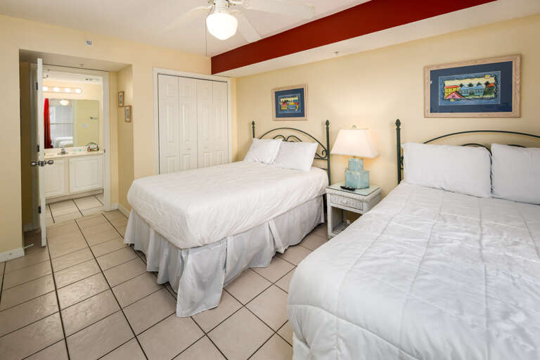 The guest room in this condo has 2 full size beds and it quite spacious