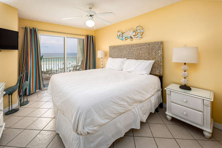 This warm inviting master bedroom has a KING size bed and the most beautiful view of the Gulf of Mexico