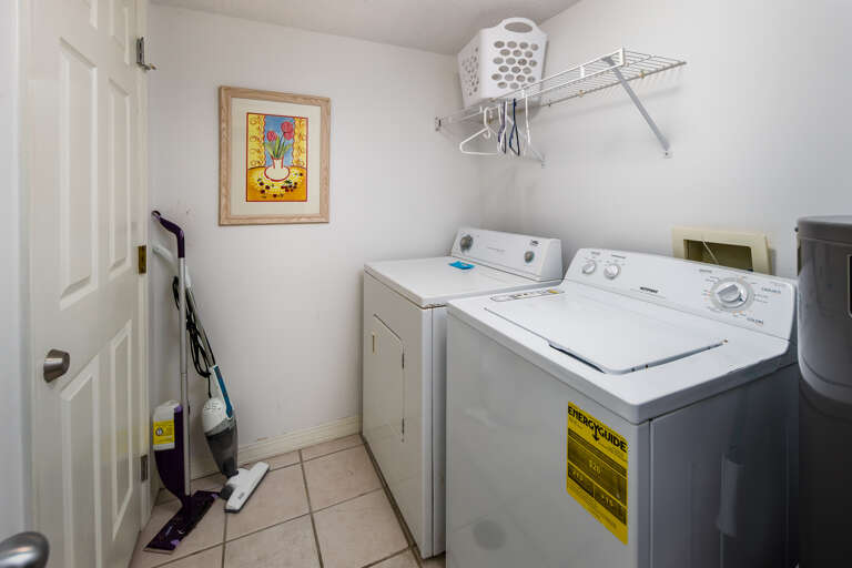 Full size washer and dryer in the spacious laundry room