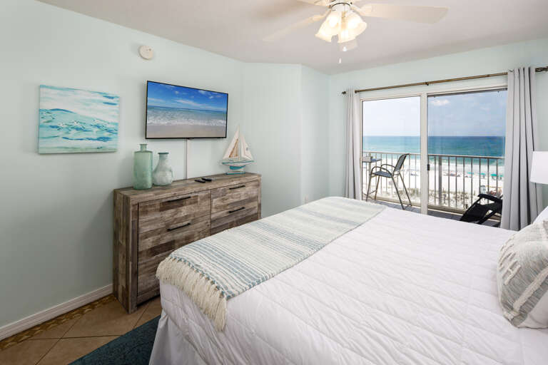 A television is also provided in this master bedroom