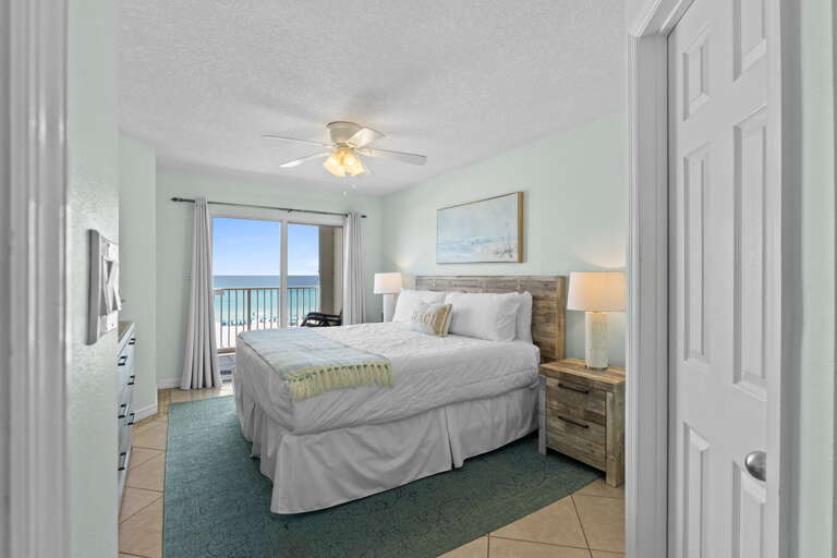 Master bedroom has a king size bed and access to the private beach front balcony.