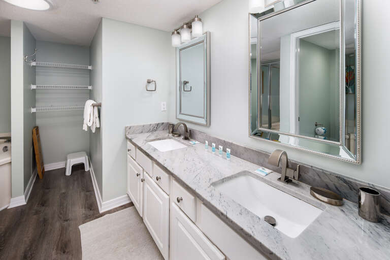 Upgrades are endless in this beautiful beachfront condo home. Separate his and her sinks make prep time a breeze.