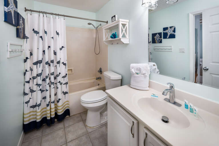Plenty of vanity space in this guest bathroom!