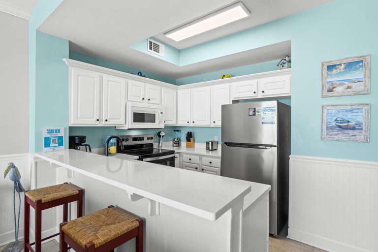 The kitchen comes fully equipped with a microwave, dishwasher, blender, toaster, and coffee maker. The bar area is ideal extra seating for extra dinner guests.