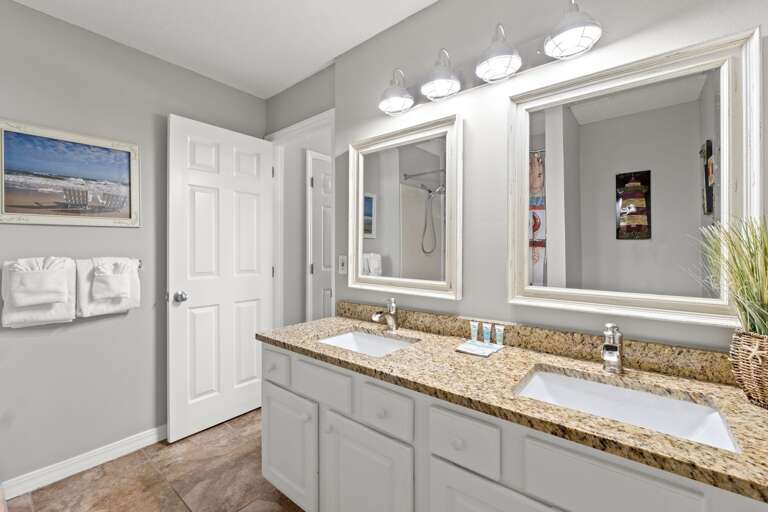 Double vanities in this bath located right off the master bedroom
