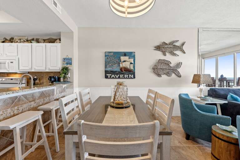 The dinning room table located next to the kitchen for your convenience