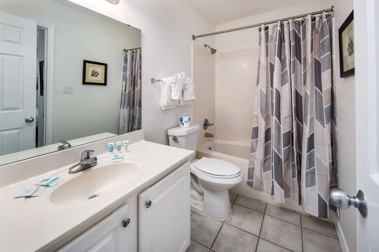 Located across from the kitchen and also has access to the guest dedroom.