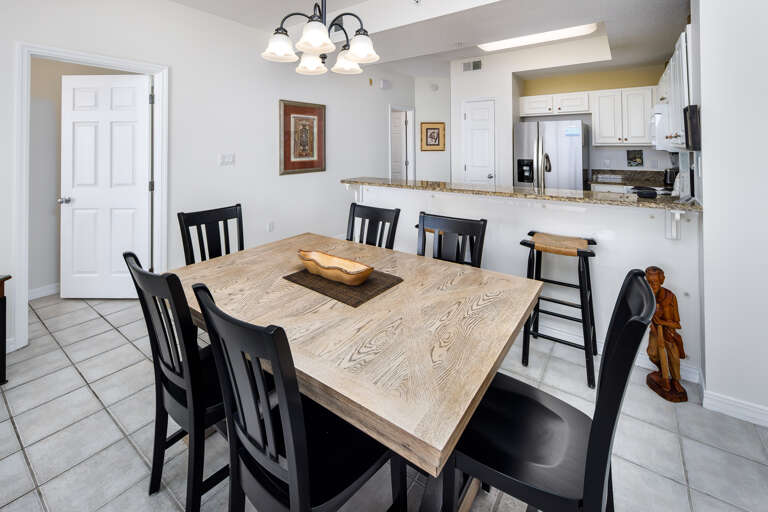 A view from the dining area to the kitchen and bar.