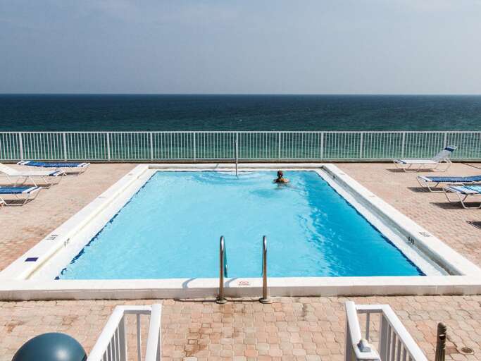 You can swim and sunbathe on top of Gulfside Condominiums WITHOUT the sand!