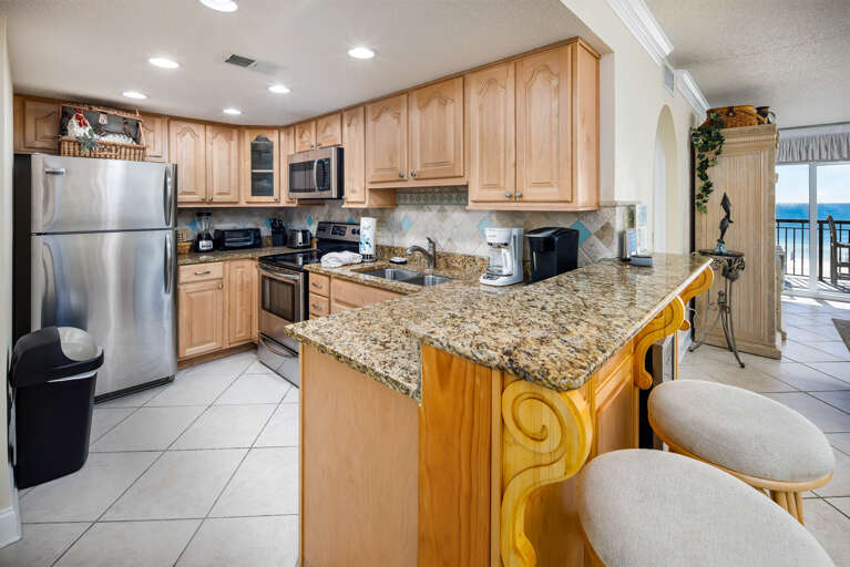 AMAZING must see kitchen. With stainless steel top of the line appliances and granite counter tops