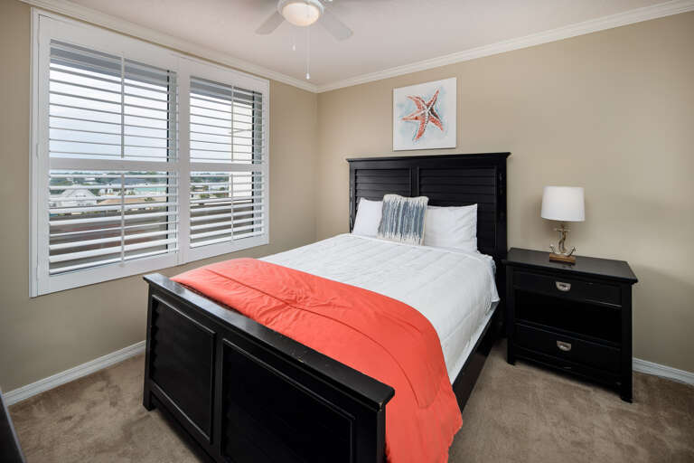 Features a queen size bed, soft bedding, flat screen TV and the entry to the second full bath.