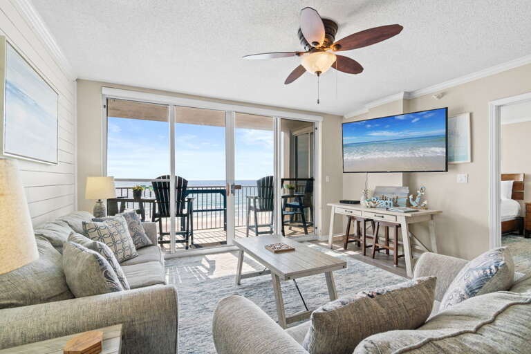 Living Room: Bright and airy space with stunning ocean views and stylish decor invites relaxation!