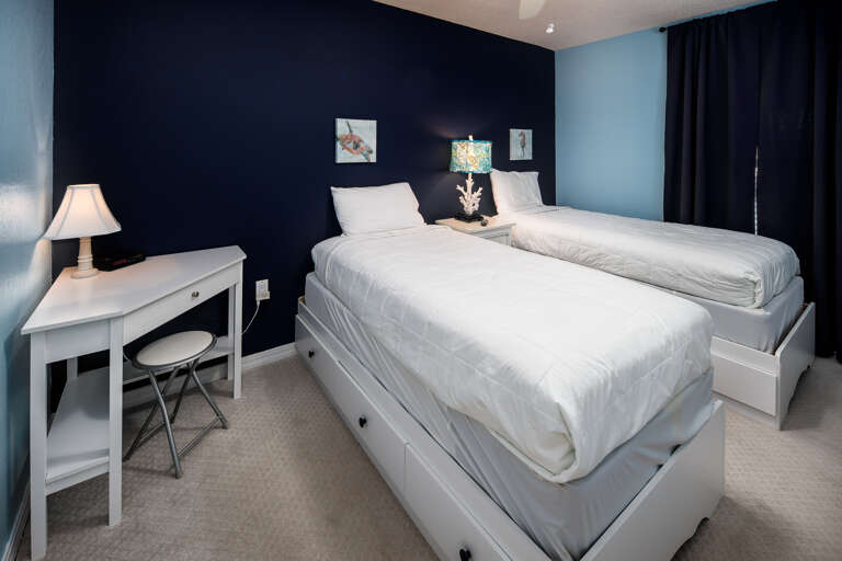 2 twin beds in the guest bedroom