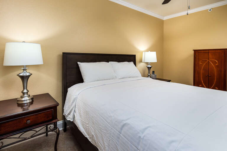 The guest bedroom has queen sized bed.  