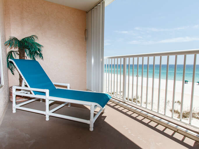 Lounge chair to catch the sunrays right next to your own palm tree!