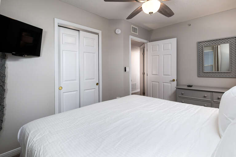 A king sized bed, lots of drawer space & a TV in the guest bedroom.  