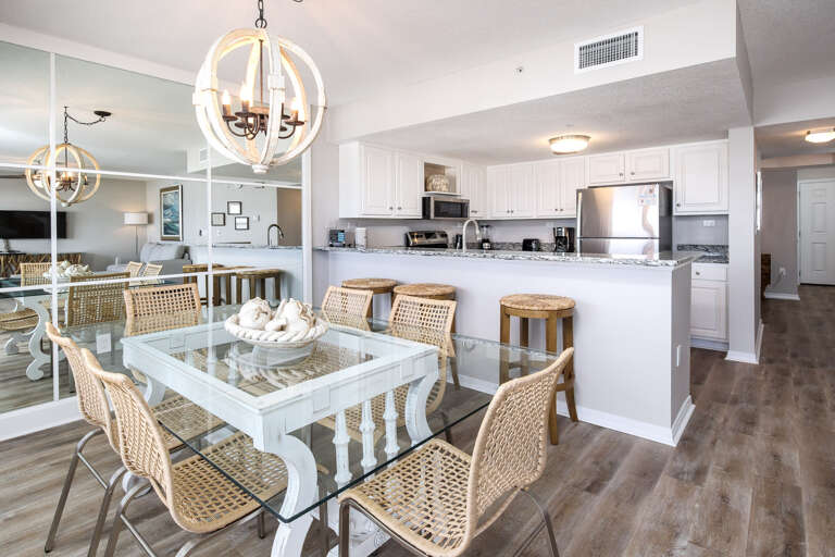 The dining room table located next to the kitchen for your convenience