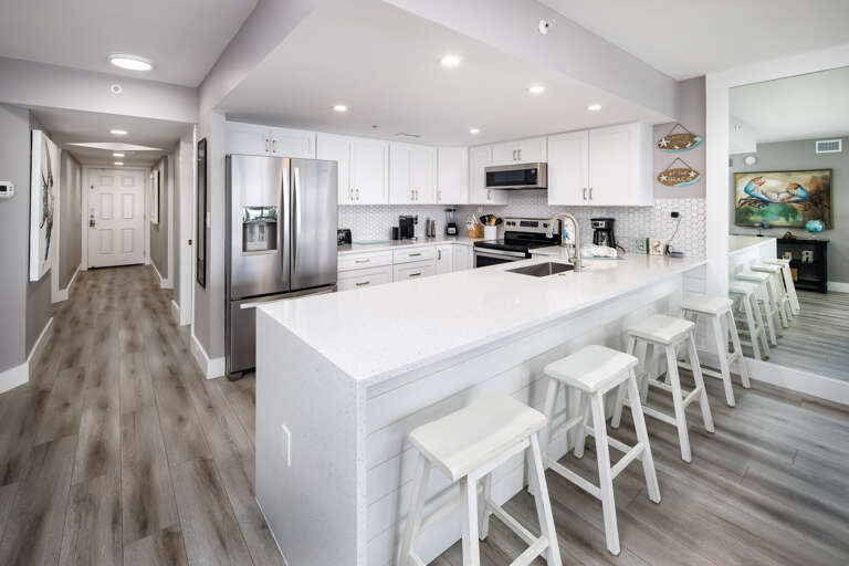 4 additional seats to enjoy some coffee and waffles at the breakfast bar! 4 additional seats to enjoy some coffee and waffles at the breakfast bar!