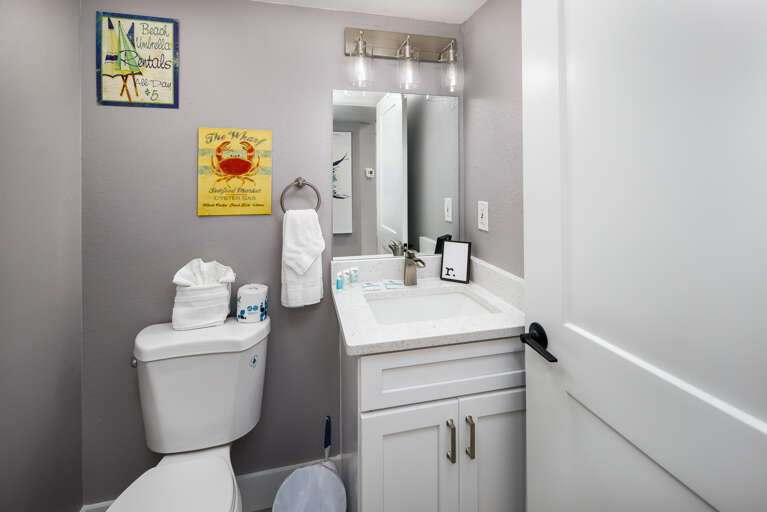 The half bath is near the kitchen/dining/living area The half bath is near the kitchen/dining/living area