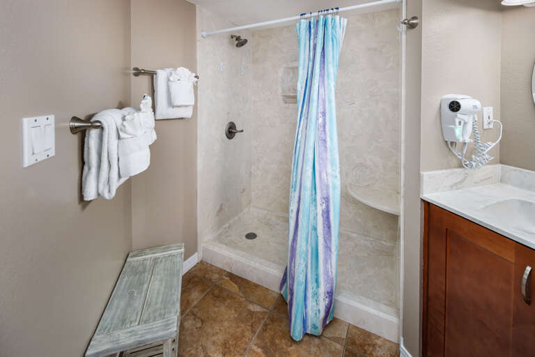 Boasts a walk-in shower 