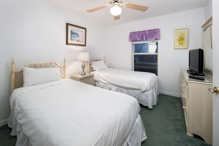 2 twins beds in the third bedroom