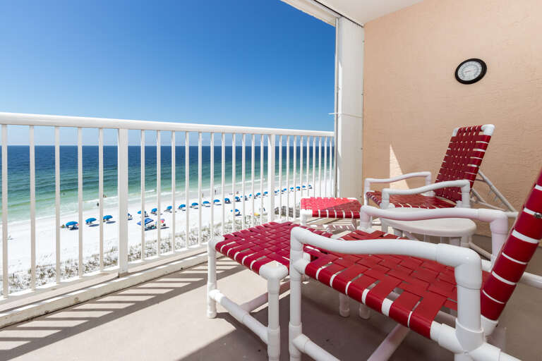 2 lounge chairs and footstools to take in the Gulf views