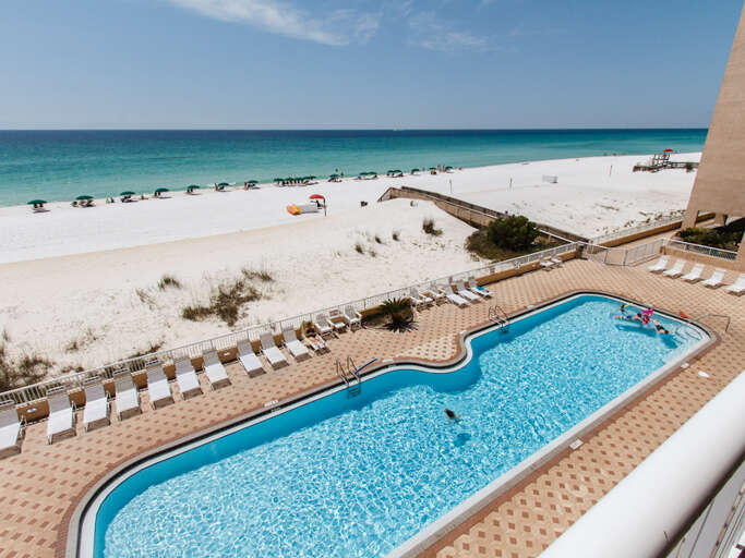 The 80 foot swimming pool is beachside! 