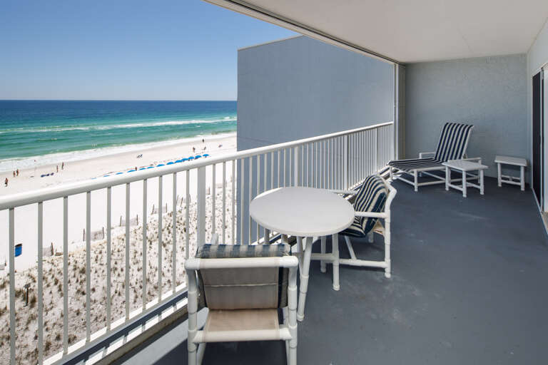 Spacious balcony with lots of seating for everyone to enjoy