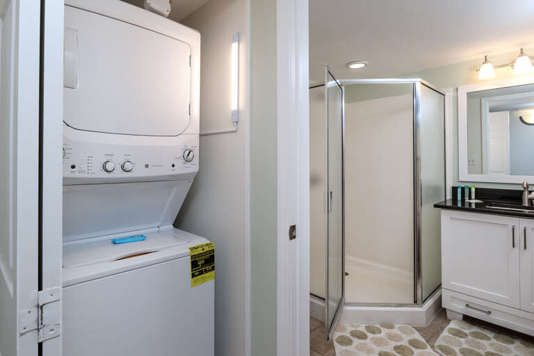 Stackable washer and dryer in unit