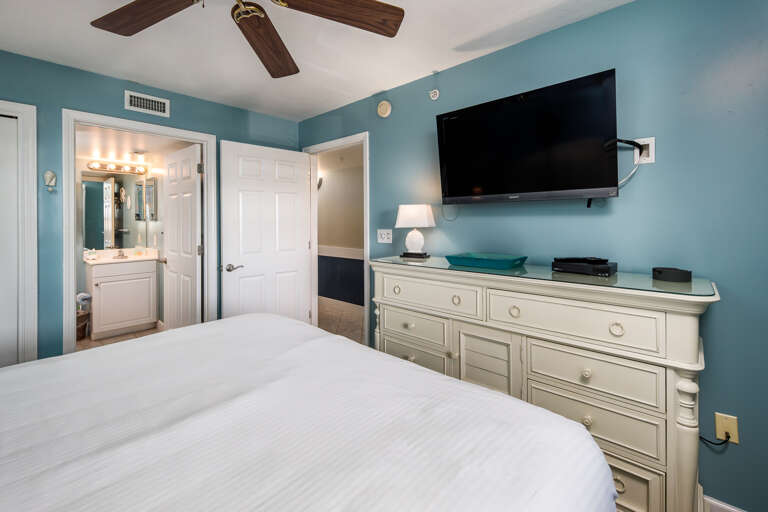 Mounted flat screen TV and en suite bathroom