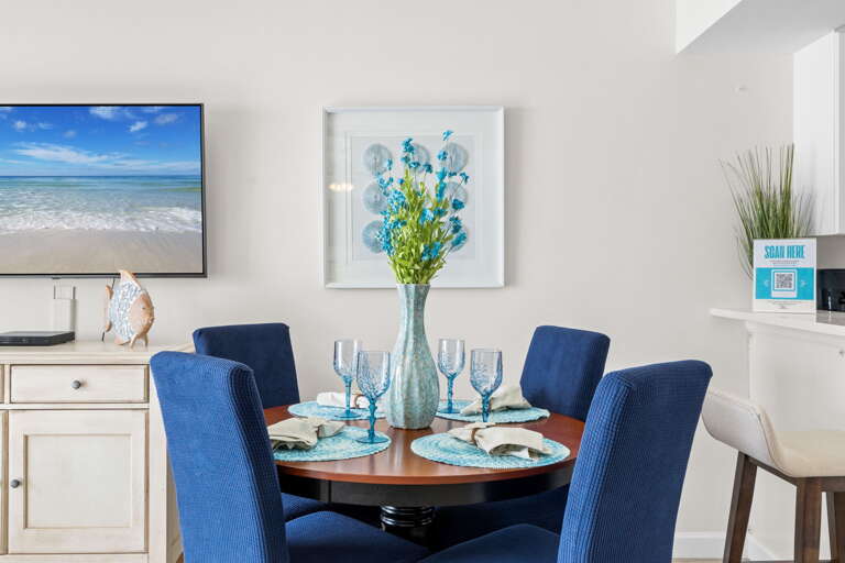 Seating for four with additional seating at the breakfast bar.