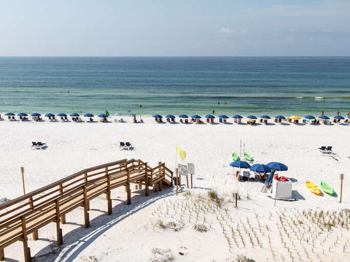 South facing view from the balcony. Just a short stroll over the boardwalk to the beach. 