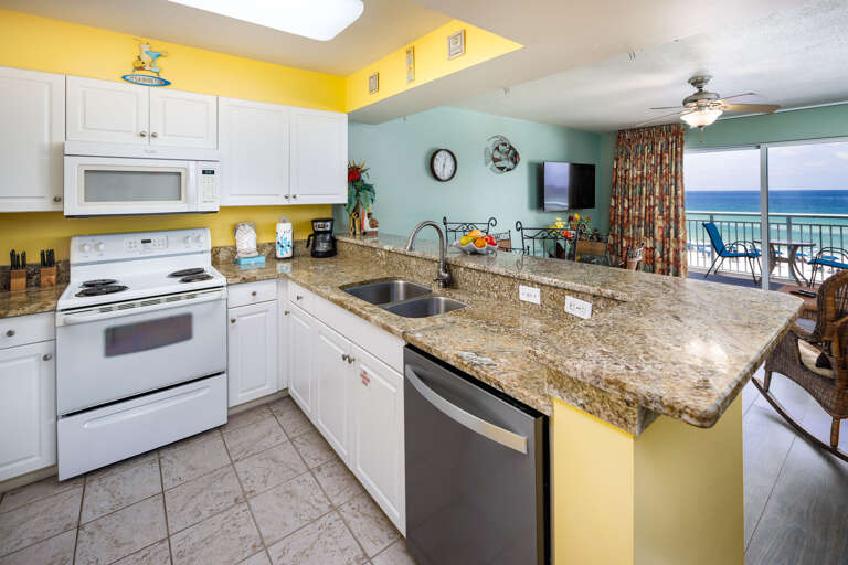 The condo has a fully equipped kitchen with plenty of counter space.  