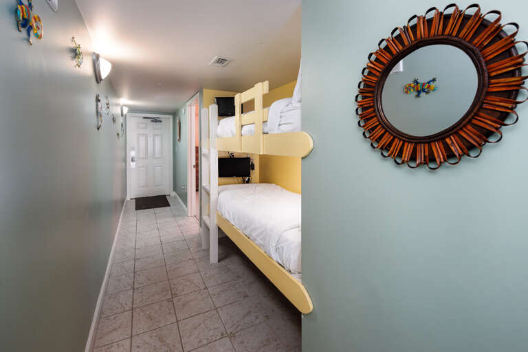 Sleeping two more guests, the bunk area features small flat-screen TVs for each level. Great for the kids to watch Cartoon Network or Disney Channel!