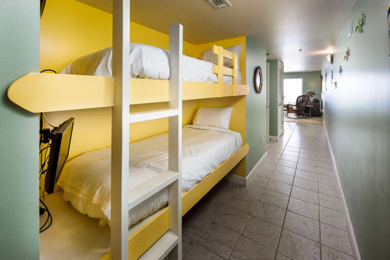 Private TV for each bunk so the little ones can self-entertain.  