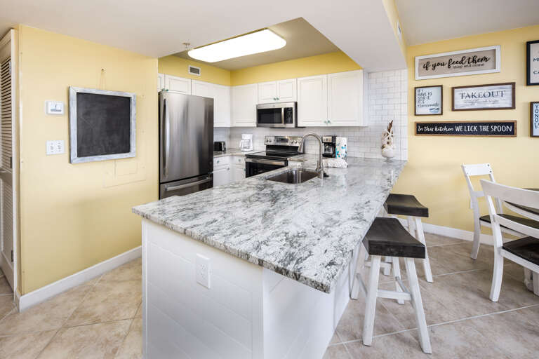 The kitchen island is perfect for a quick snack
