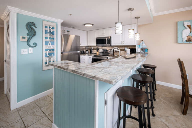 Everyone has a place to sit for a big family dinner or a quick snack during the day with table seating for four and four more at the breakfast bar.