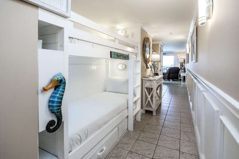 In addition to lovely coastal comforters, these bunks are the perfect home for the little ones during your vacation!