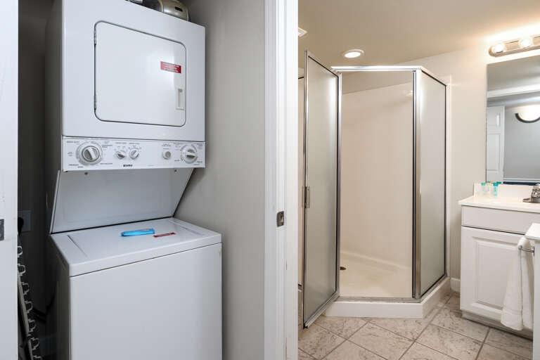 Washer and dryer in the condo including a walk-in shower for your convenience. Washer and dryer in the condo including a walk-in shower for your convenience.