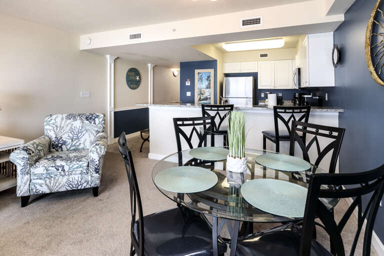 Enjoy a relaxing beach-side meal from one of the four seats at the dining table Enjoy a relaxing beach-side meal from one of the four seats at the dining table
