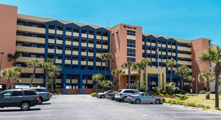 Built in 2002, the Pelican Isle is a beautiful seven-story condo right on the beach. Each unit has a private balcony that directly faces the beach and views the resort’s courtyard or pool area.